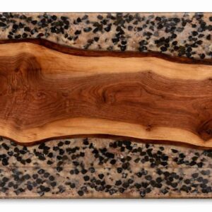 Rectangular panel featuring natural wood grain in center with speckled concrete containing black aggregates above and below